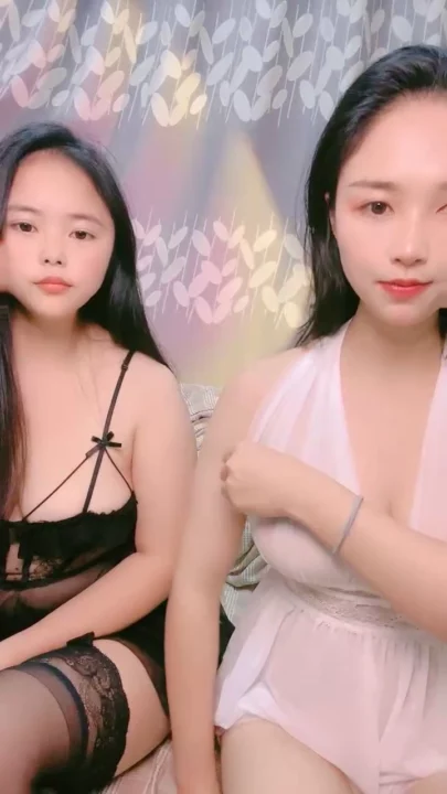 Screenshot 3 from Chinese Amateur Lesbian Lingerie Showcase — Lulu and Friend Tease in White Babydoll