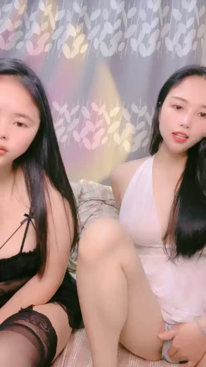 Screenshot 6 from Chinese Amateur Lesbian Lingerie Showcase — Lulu and Friend Tease in White Babydoll