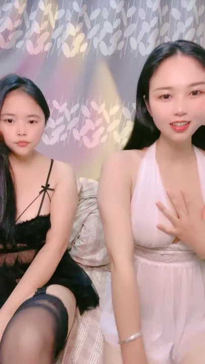 Screenshot 7 from Chinese Amateur Lesbian Lingerie Showcase — Lulu and Friend Tease in White Babydoll