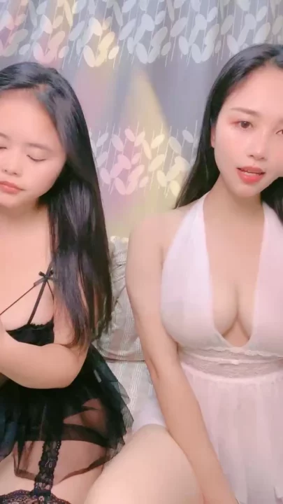 Screenshot 10 from Chinese Amateur Lesbian Lingerie Showcase — Lulu and Friend Tease in White Babydoll
