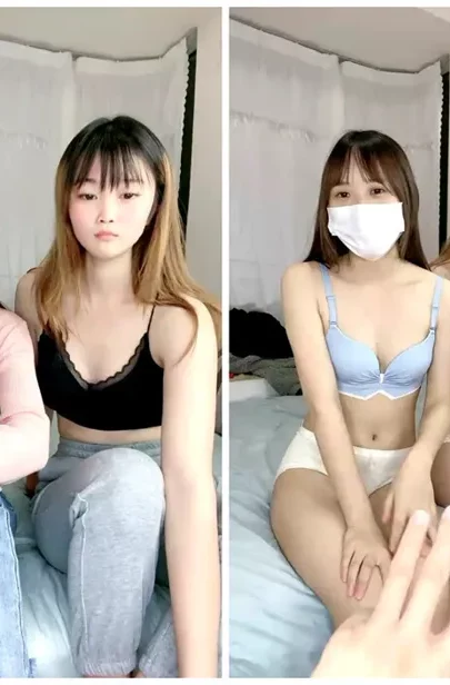 Screenshot 17 aus Chinesische Amateur-Lesben beim Scissoring — Petite Schönheiten in Dessous und Masken
