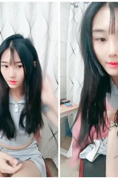 Screenshot 17 from 中国业余第一视角 — 穿灰色crop top和短裤的娇小亚洲女孩在床上摆姿势