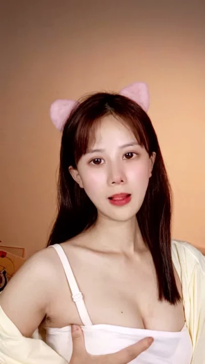 Screenshot 1 from Chinese Amateur Solo Masturbation — Shaved Pussy Self-Tease with Cat Ears