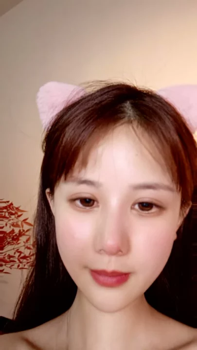 Screenshot 10 from Chinese Amateur Solo Masturbation — Shaved Pussy Self-Tease with Cat Ears